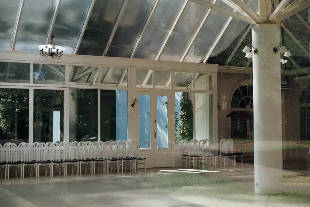 Cleaning the glass roof of a residential conservatory